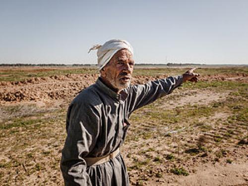 Farmer in Wadi Al Rayyan Farmer in Wadi Al Rayyan